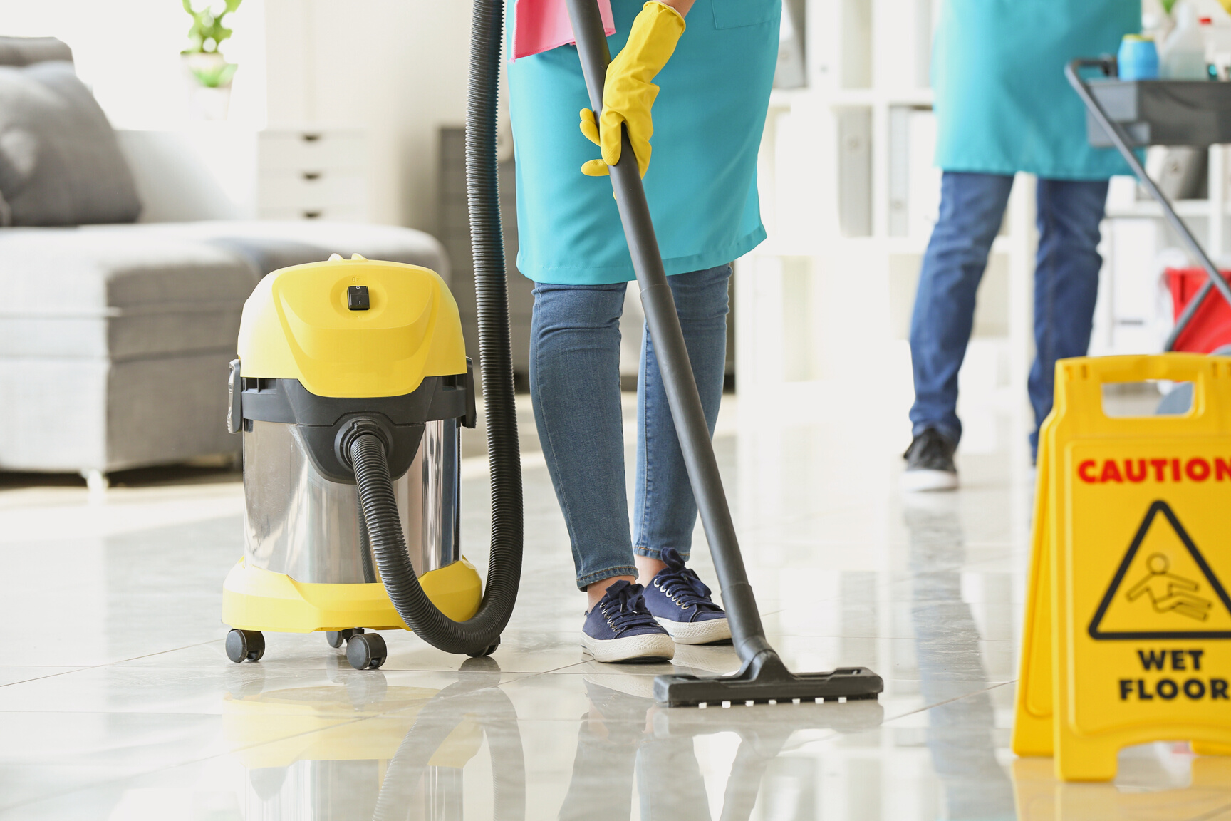 Team of Janitors Cleaning Office